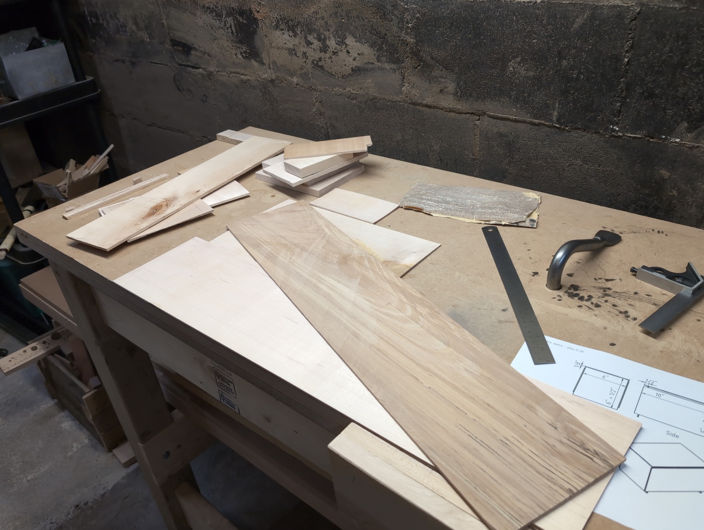 The wood offcuts laid out on a workbench