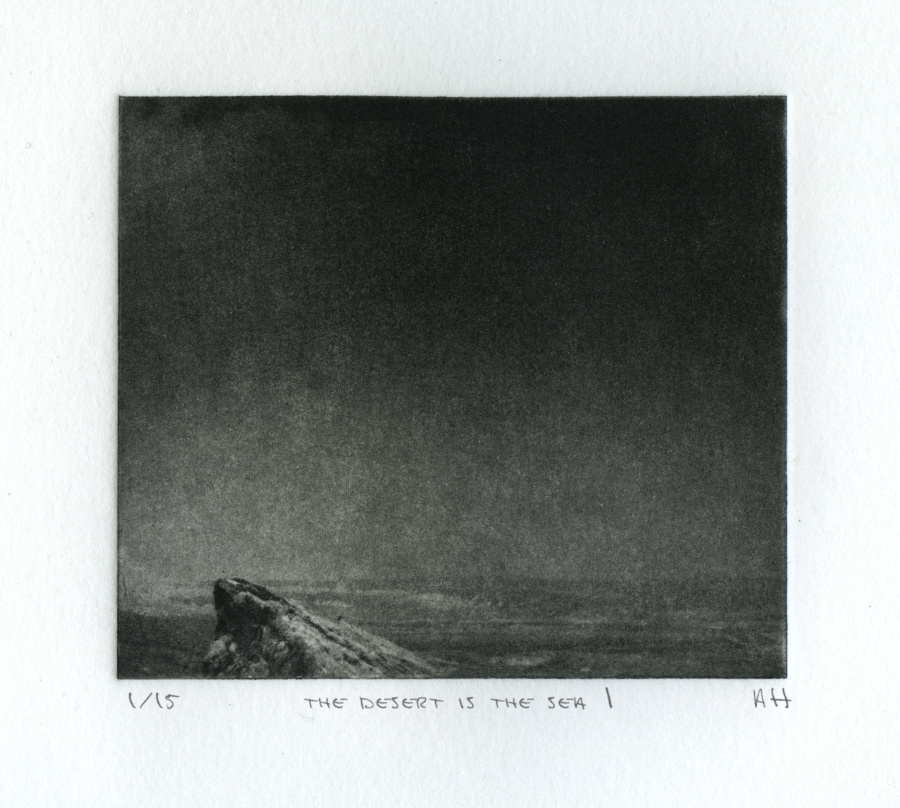 A black and white landscape etching depicting a fairly dark and empty, unclear, desert